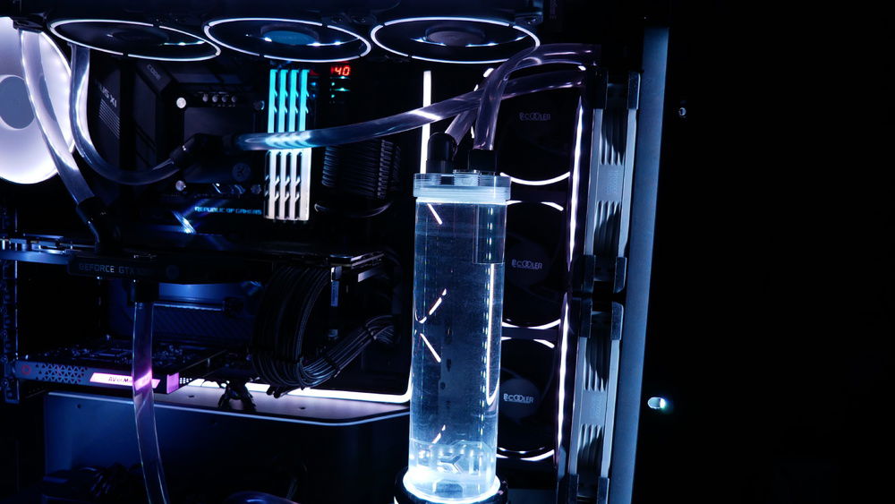 You can mostly see how the one neon RGB strip goes from the bottom left, hooks a left, and goes straight up next to the side intake fans.