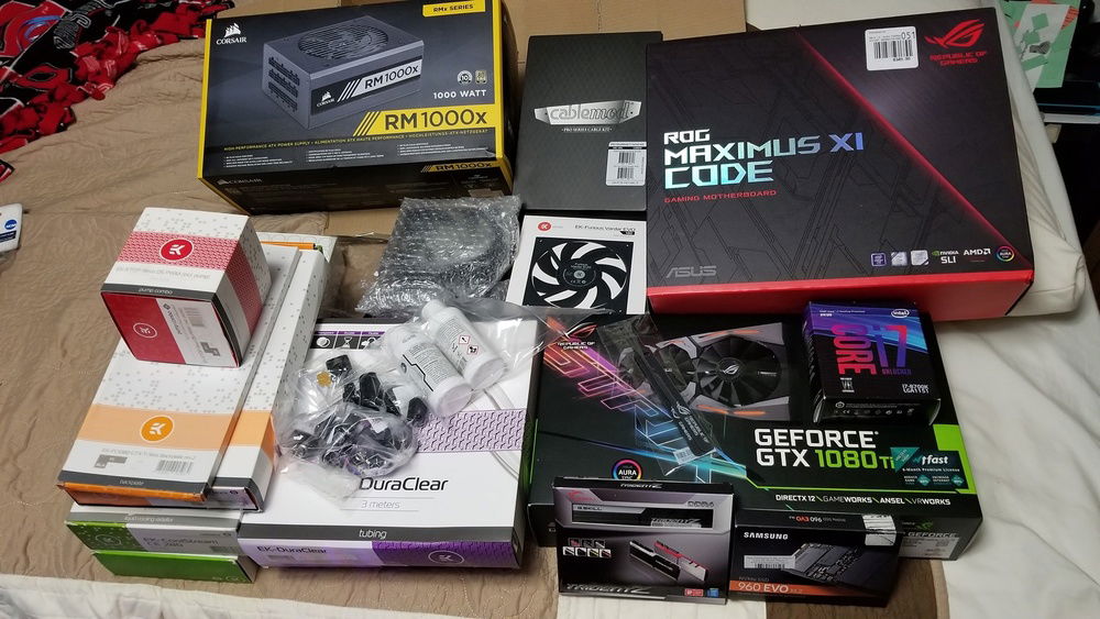 The parts, excluding the CPU block and reservoir, at this stage of the build.