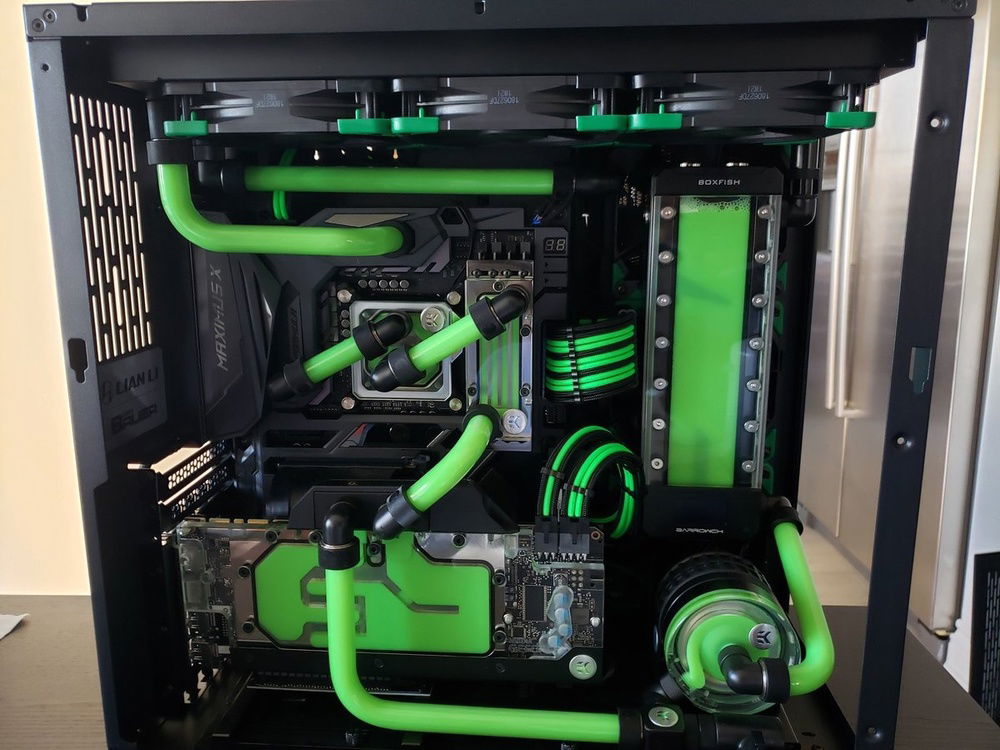 Final layout of the build. I darkened the EK-Cryofuel Solid Neon Green coolant with some dark blue dye to get it to match the color of the cables