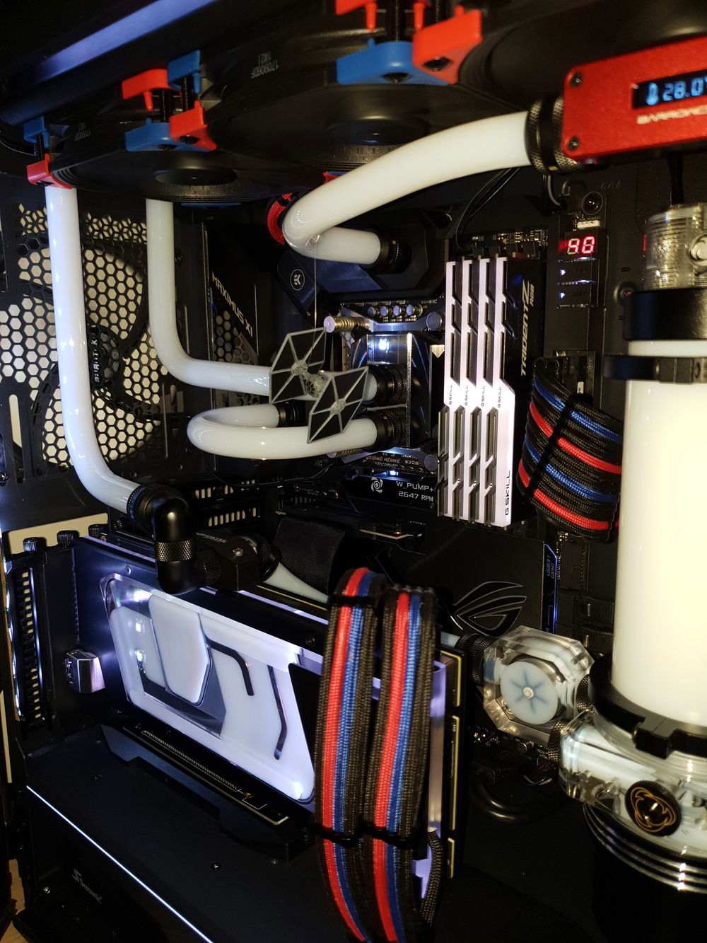 Vertical mount installed, running white pastel coolant and using the rgb lighting to colour it in use. Note the TIE fighter haha