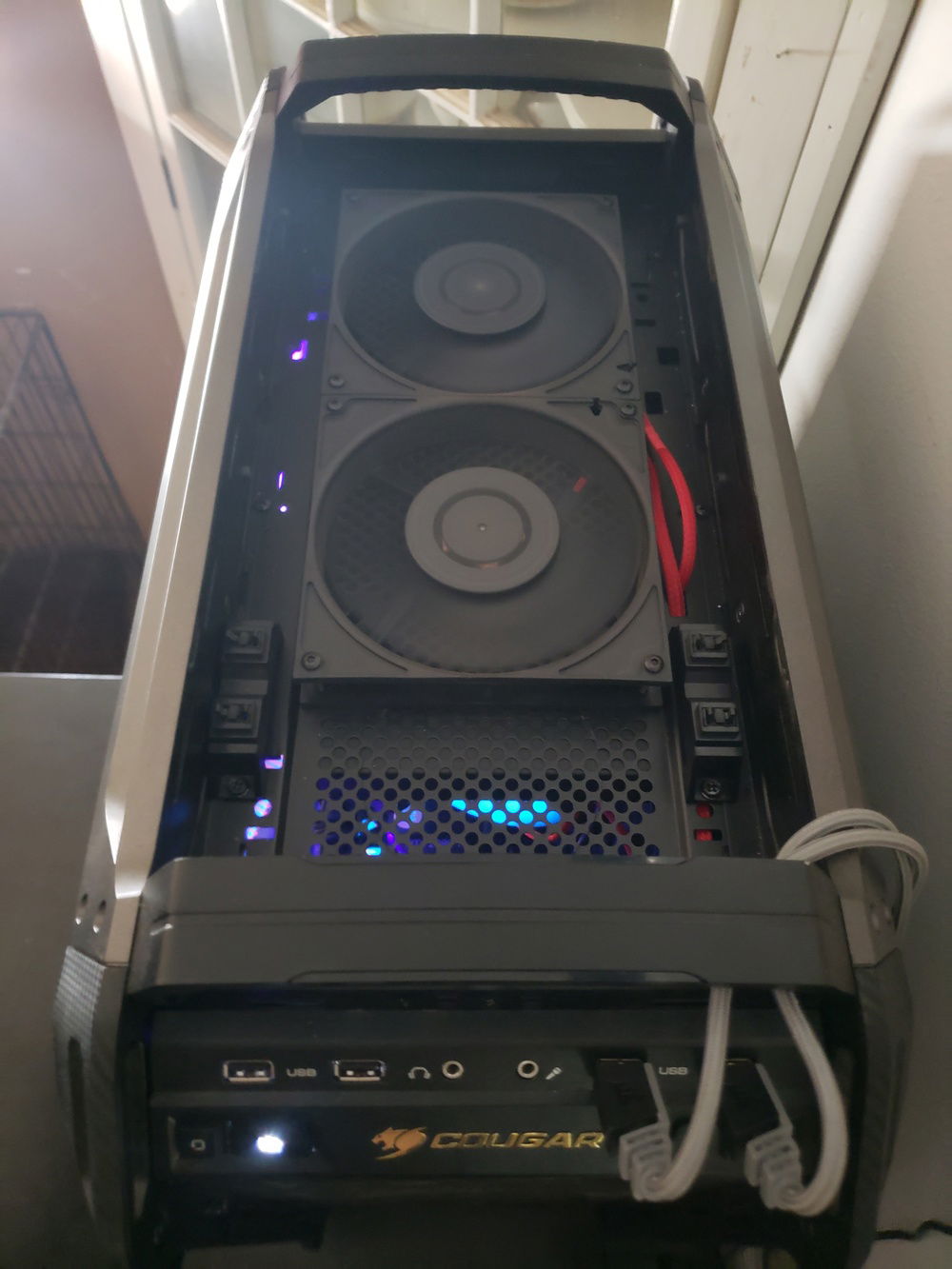 Top fans, 2x 140mm pushing down through a 30mm thick rad