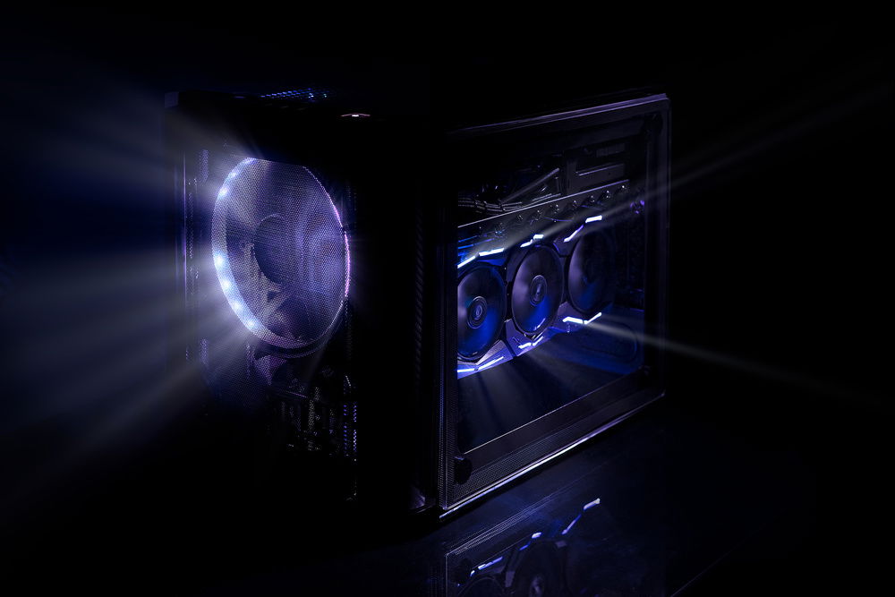 Hanging upside-down from the cases's ceiling, a Strix RTX 2080 OC sits confidently above it all.