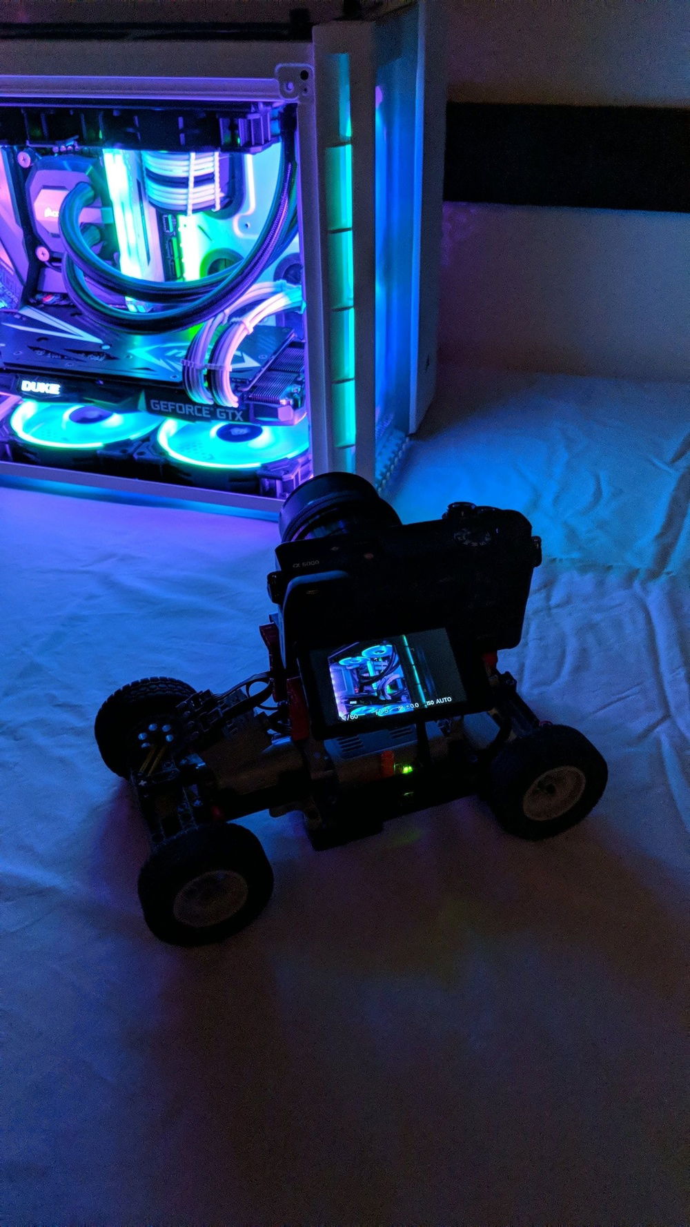 Filming a video with a camera on top of a LEGO car I built