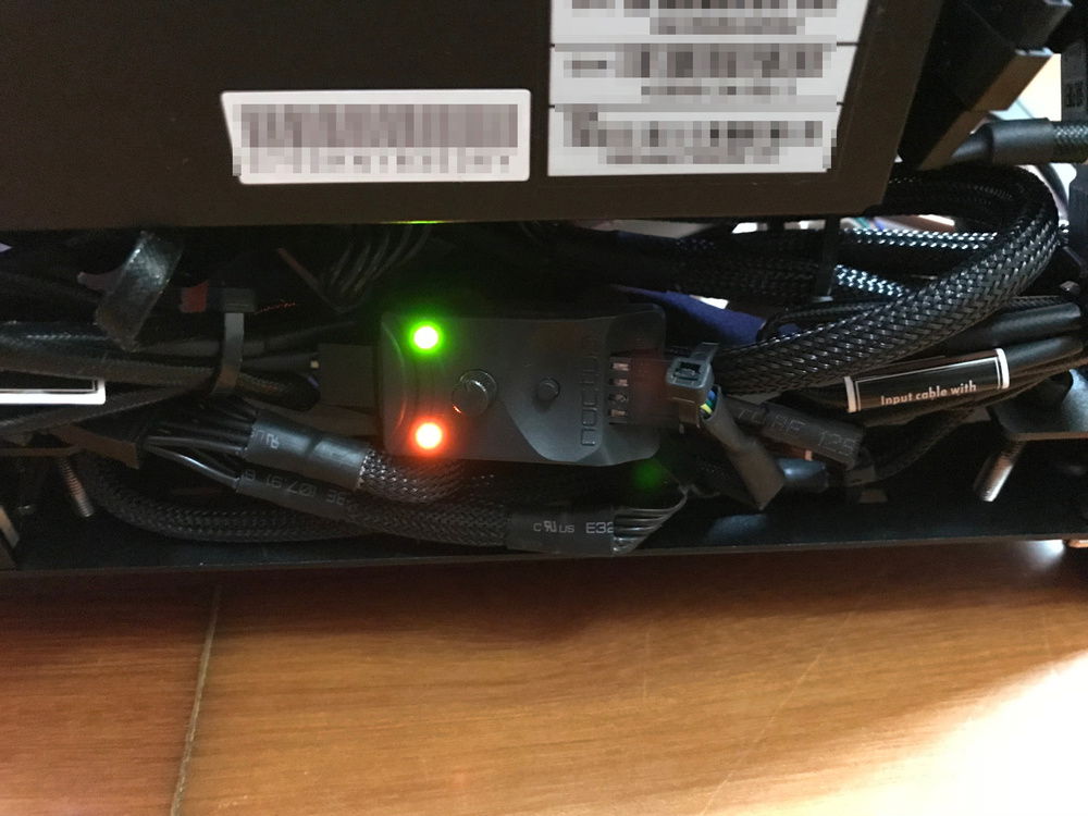 The PSU is exposed and easily accessible.
The front part has some cable management area, and the place for the fan controller (Noctua FC-1).
It controls all 4 intake fans at the bottom.