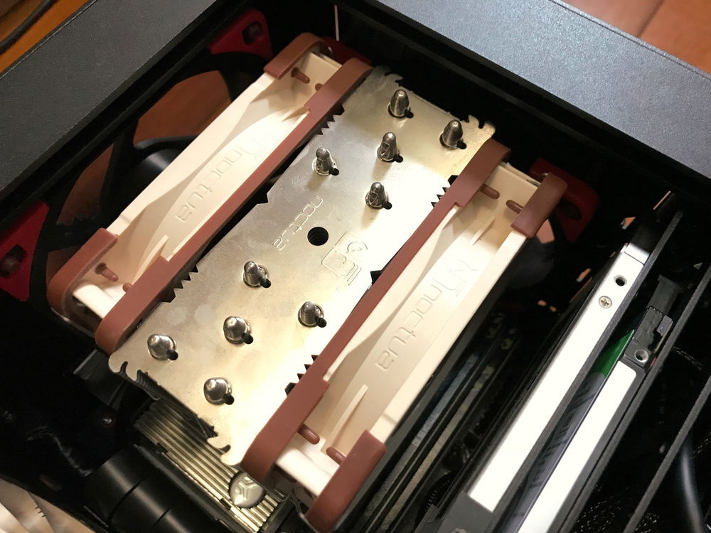 There is a 1800x @4.0GHz under the Noctua U12S cooler
Fresh air comes in from the bottom, through the CPU cooler , then exits via top and rear exhaust fans (NF-S12A)
This cooler is 158 mm in height.
The case allows maximum of 165 mm.