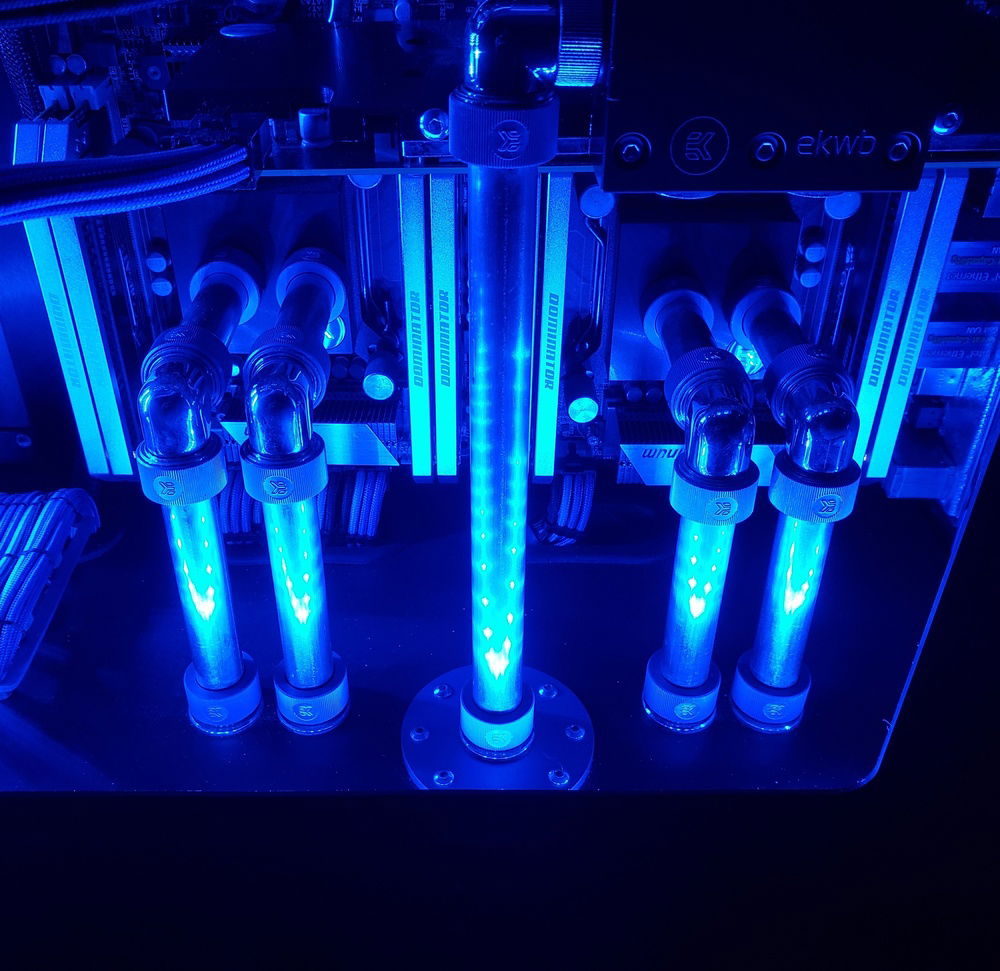 EK Evo acetal CPU blocks lit by CableMod 60 cm blue magnetic strips. 64 Gb (8x8) Corsair Dominator DDR3 1866.