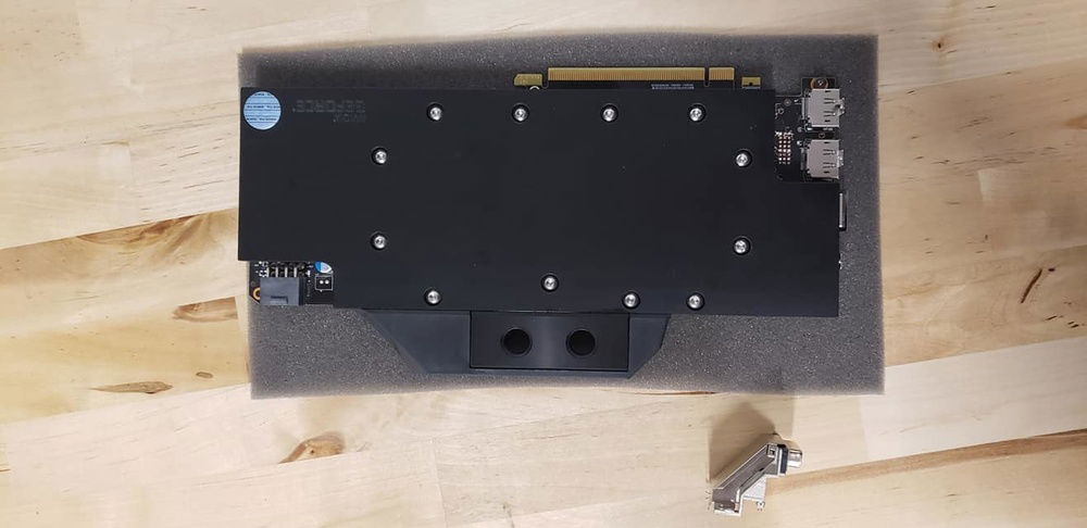 First card DVI port removed, block installed, and screws replaced with SS button cap.