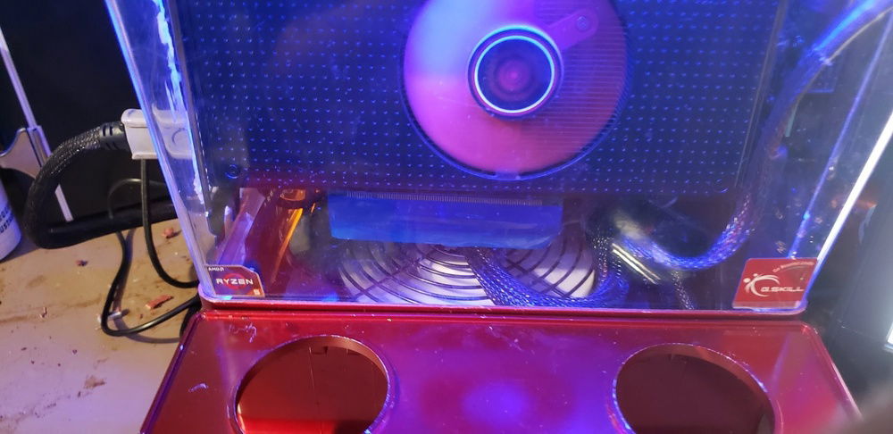 Front of the computer, angled downward to show the psu