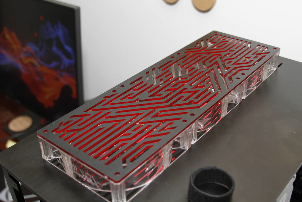 I got a custom made fan grill for the side rad.  

I found him on Etsy.  

https://www.etsy.com/shop/jmmods?ref=l2-shop-header-avatar

He worked with me to come up with the design which is the ASUS ROG tribal pattern.
I think it is going to look amazing in front of the RGB fans for the side panel radiator.