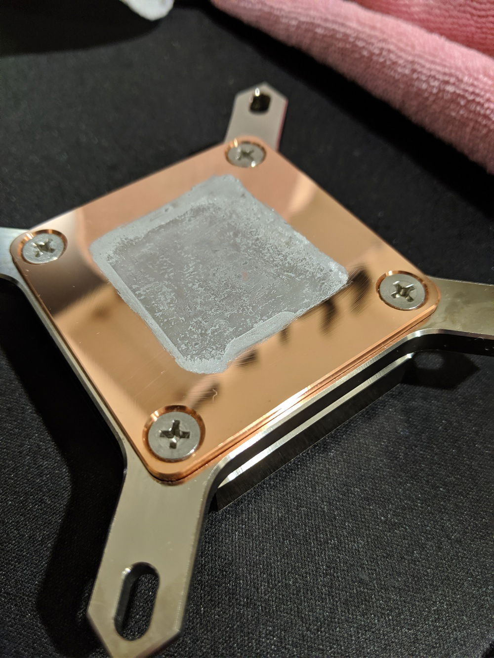 The liquid metal bonded between my Rockit Cool IHS and the cold plate on the CPU waterblock.  My temps really started to spike.