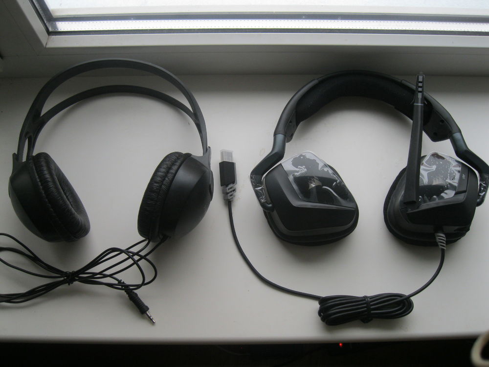 New USB headset next to old 3.5mm headset.