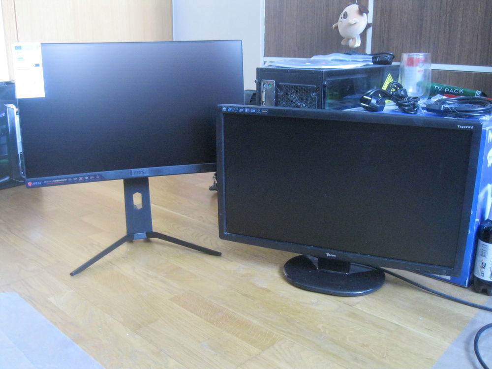New MSI Optix MAG241CR monitor (left) next to old Topview T2491Wd monitor (right). Monitor specs; old: 24", 1080p, TN panel, 60 Hz, 1ms, flat screen, input DVI-D (dual link), adjustable tilt. New: 23.6", 1080p, VA panel, 144 Hz, 1ms, curved screen (1500R), input DisplayPort 1.4, adjustable height and tilt.