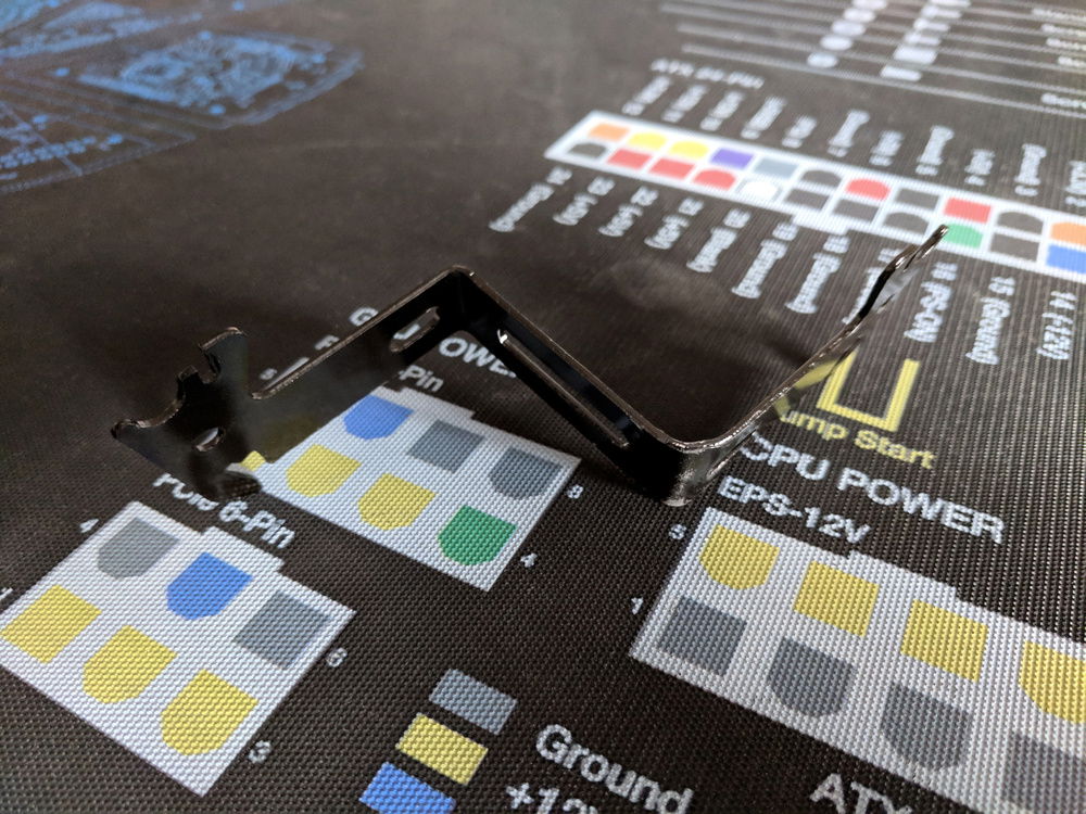 The bracket I modified to mount the optical drive.