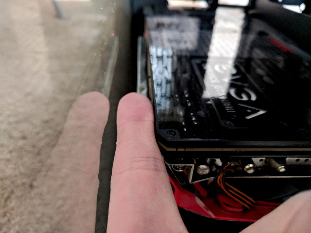 There was enough clearance between the side panel and the GPU for the sleeved cables, so I decided to vertically mount it.