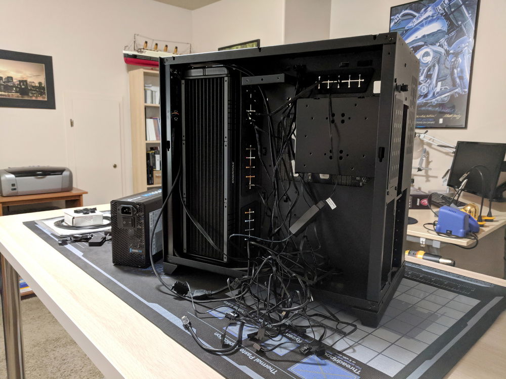 It's a damn mess. Thought about doing custom length sleeved cables for the fans, but you can't see the cables and since I had a few bad ones, I don't want to mess with it. The cable management will be a blast.