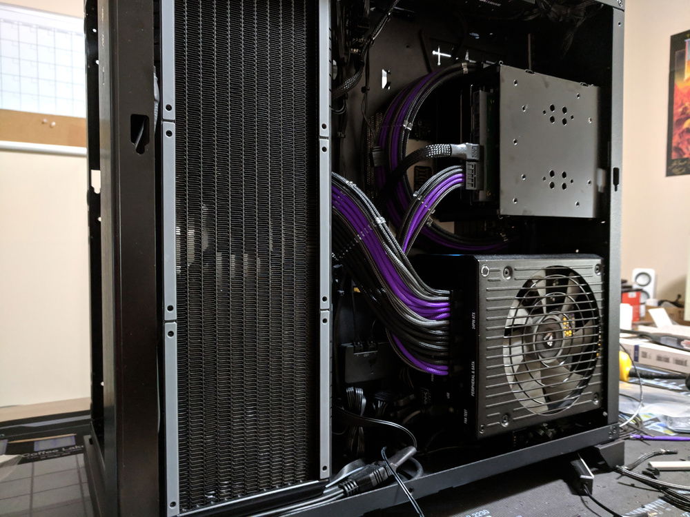 I failed to realize that the cables would have to crossover at the PSU. While it's not quite how I imagined it, it's close. Onto the PCIe cables.