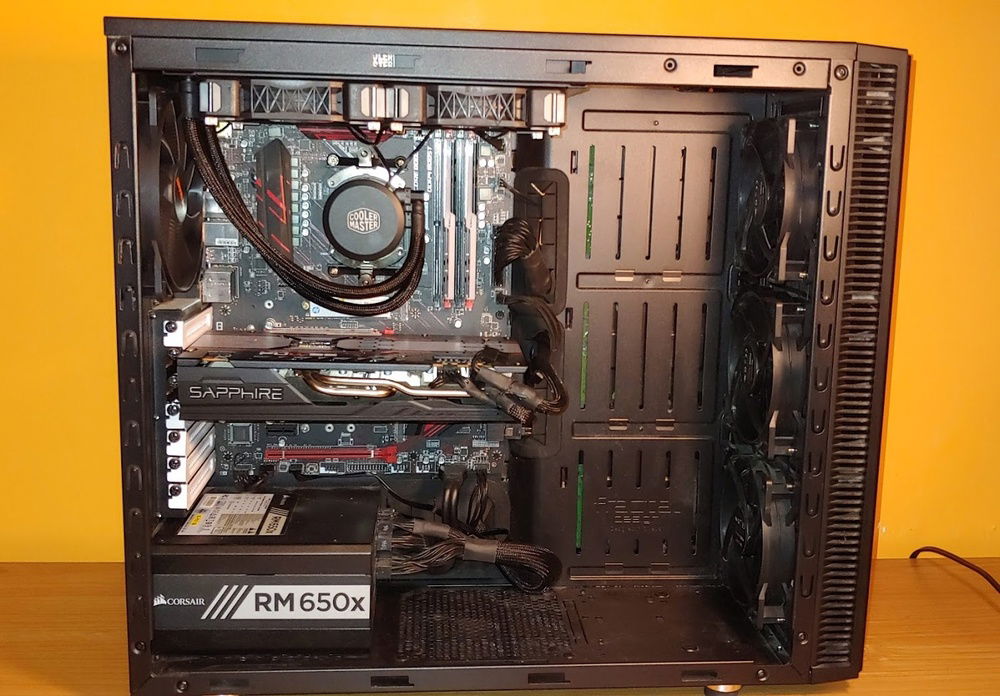 Inside of case after upgrades (new CPU liquid cooler, new GPU, new RAM)