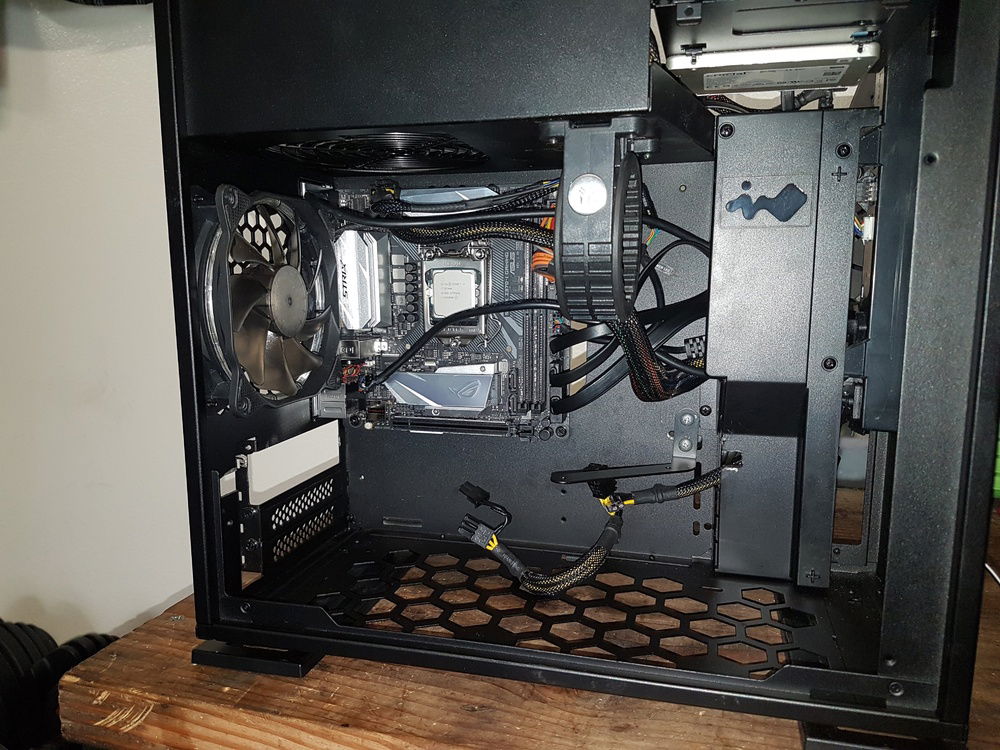 I needed to make holes for the bracket to hold the cooling pump