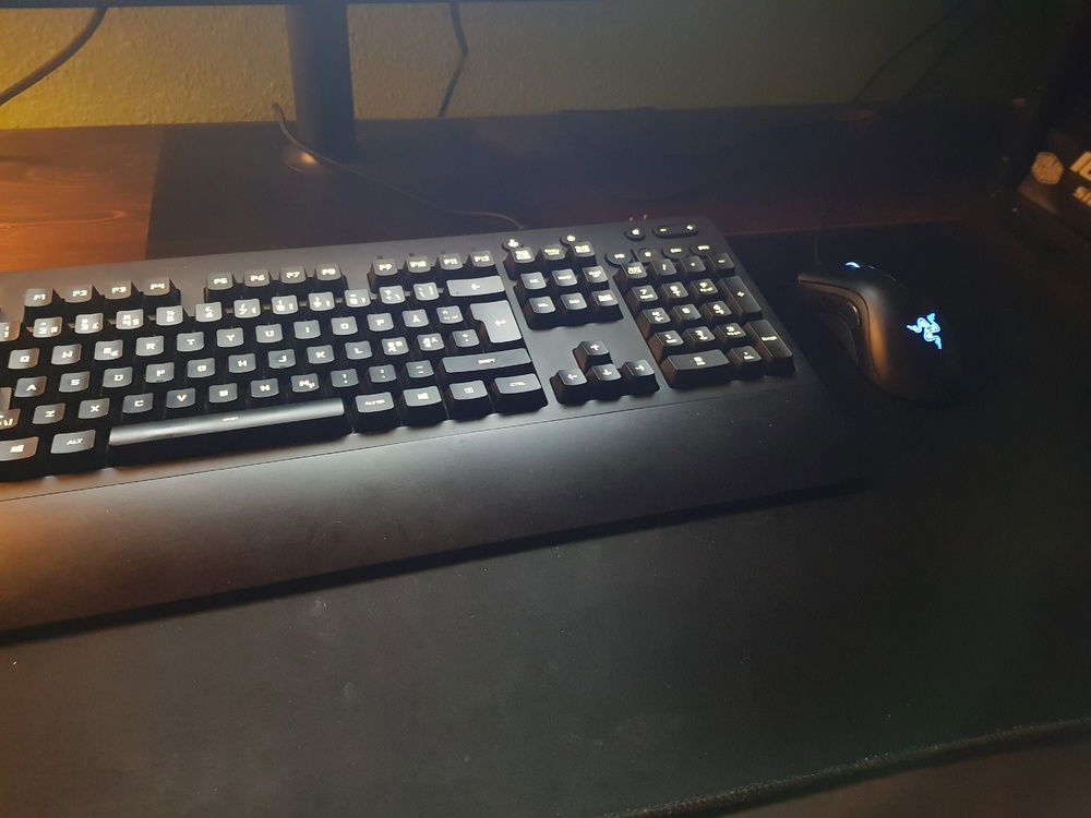 Keyboard, mouse and off brand mousepad from China.