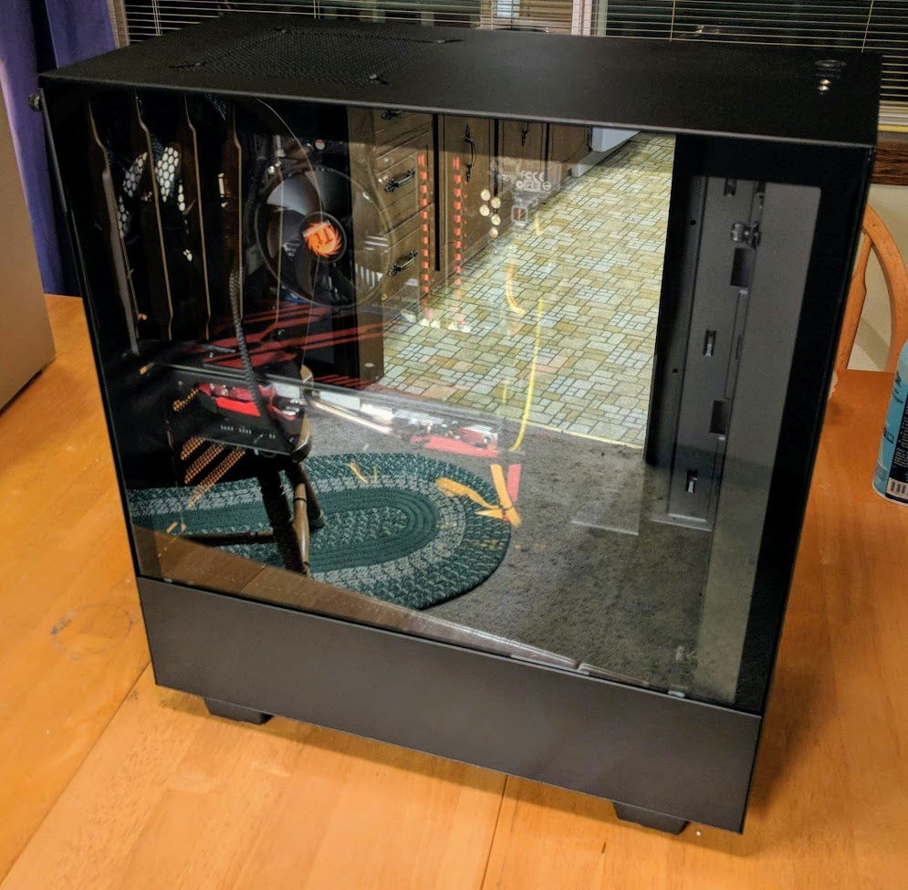 New case with glass side panel