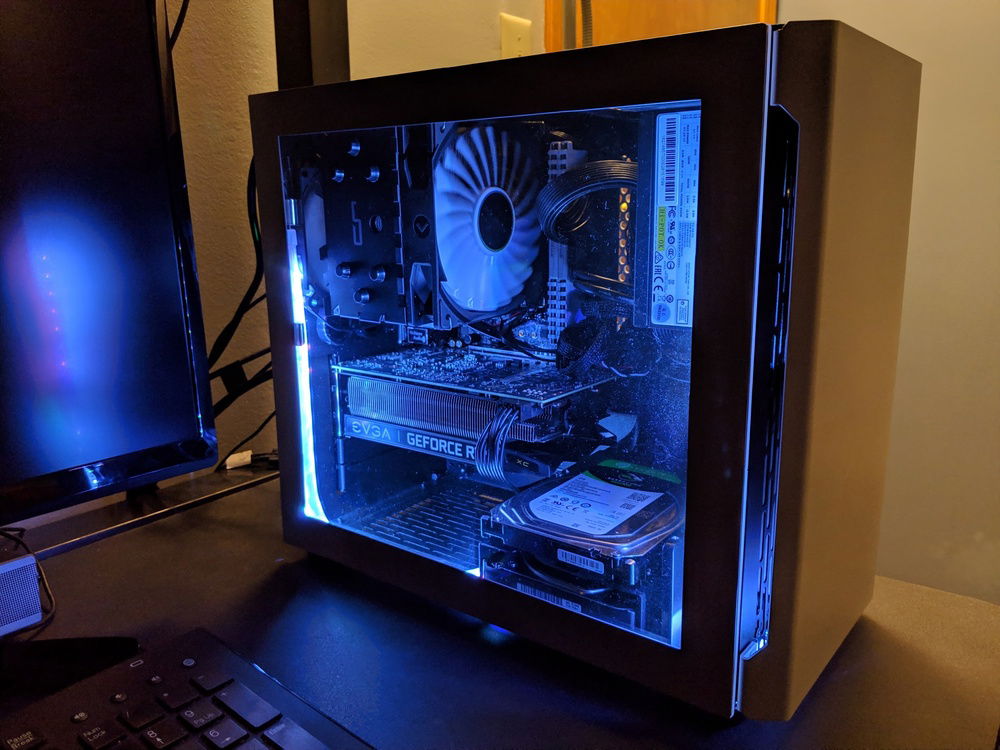 Virtually no cable management options in this case, but still manages to be reasonably clean. Room to spare for more hard drives!