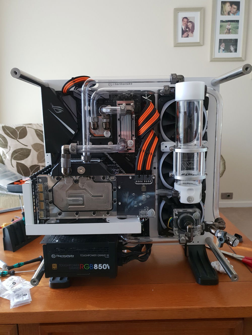 Front view of the loop completed. decided to straighten out pipe next to the PSU because it looked out of place. Reservoir has also been raised to create seperation between the pump. Ready to leak test?!!