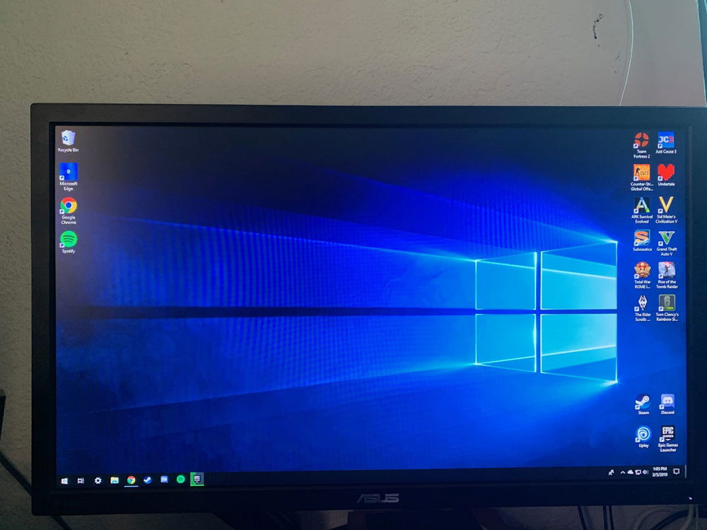 27" Asus gaming monitor mounted on a vesa arm