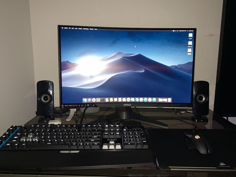 Monitor, peripherals, old glass desk