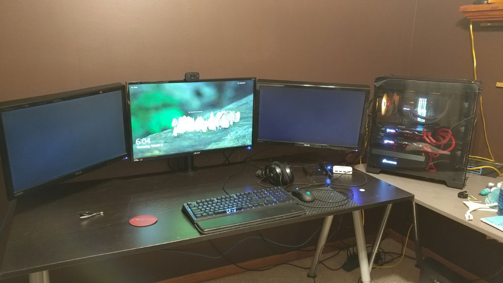 Professor Overkill 1.0 Battlestation 1.0.

Triple monitor arm with a XB270HU in the middle, and 2 24 inch Asus TN panel 1080Ps on the sides.