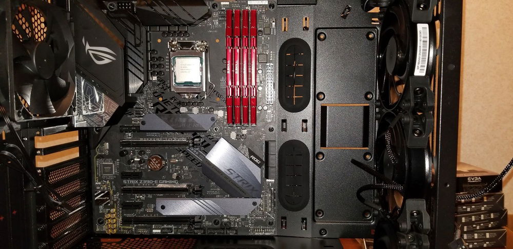 Motherboard, RAM, and CPU installed.