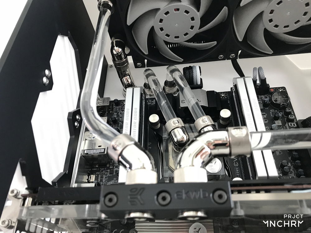 Looking up at the loop for the radiator and CPU, that runs behind the mid plate.