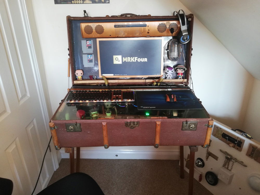 1920's Steamer Trunk "Portable" Desk PC, with a Steam Punk theme.

In its current state, not 100% finished, but fully working.