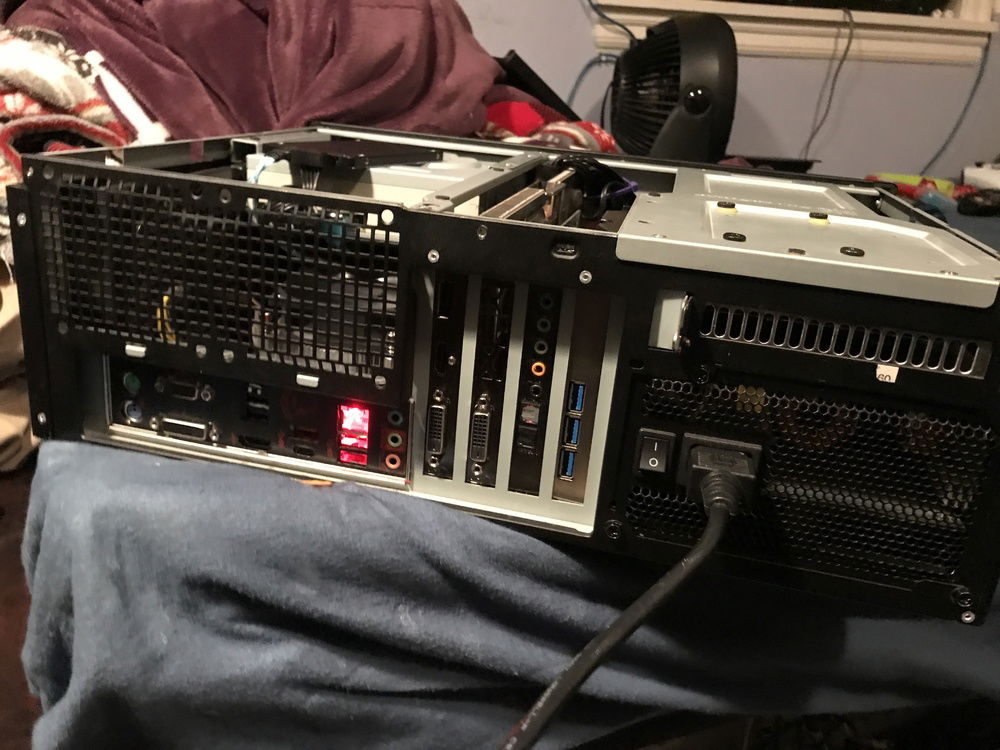 The back of my pc, wanna get 2 new 80mm exhaust fans for the back