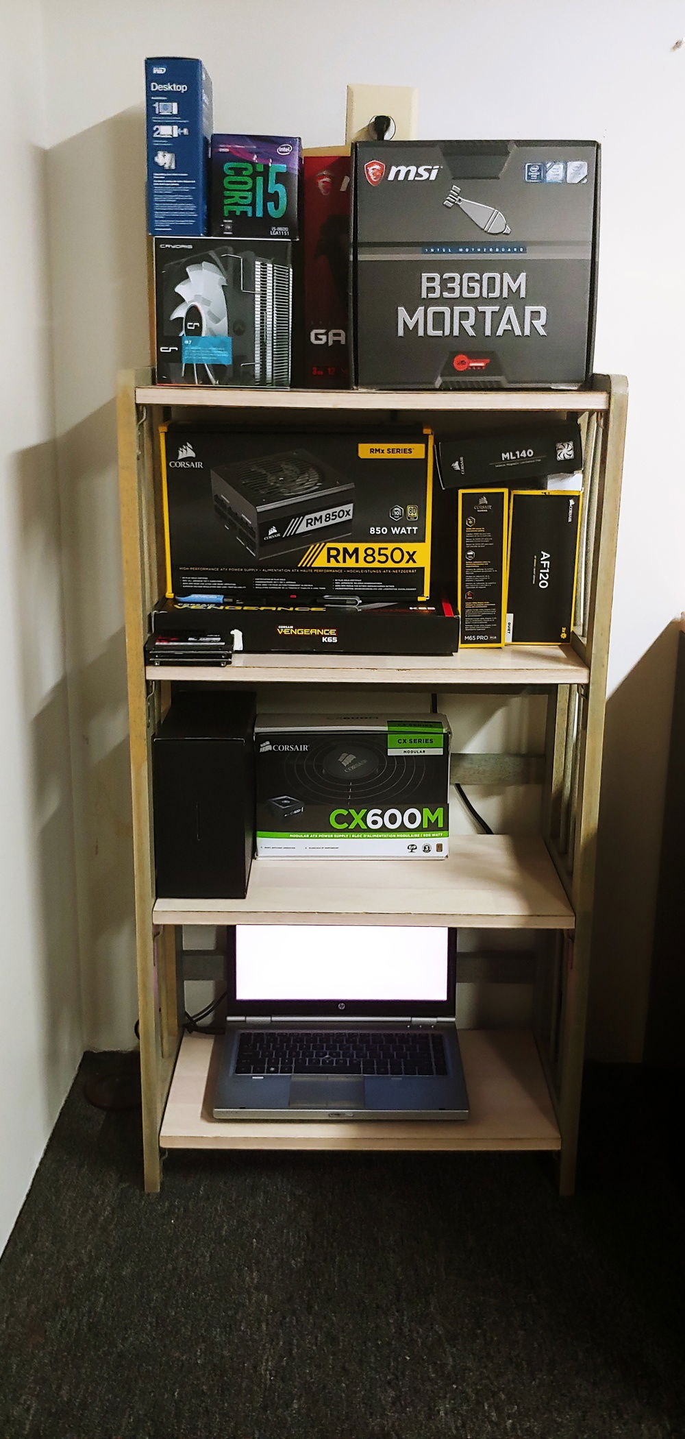 Shelf that I keep all of my component boxes on. I keep these handy in case I need to swap parts or do general maintenance on my PC.