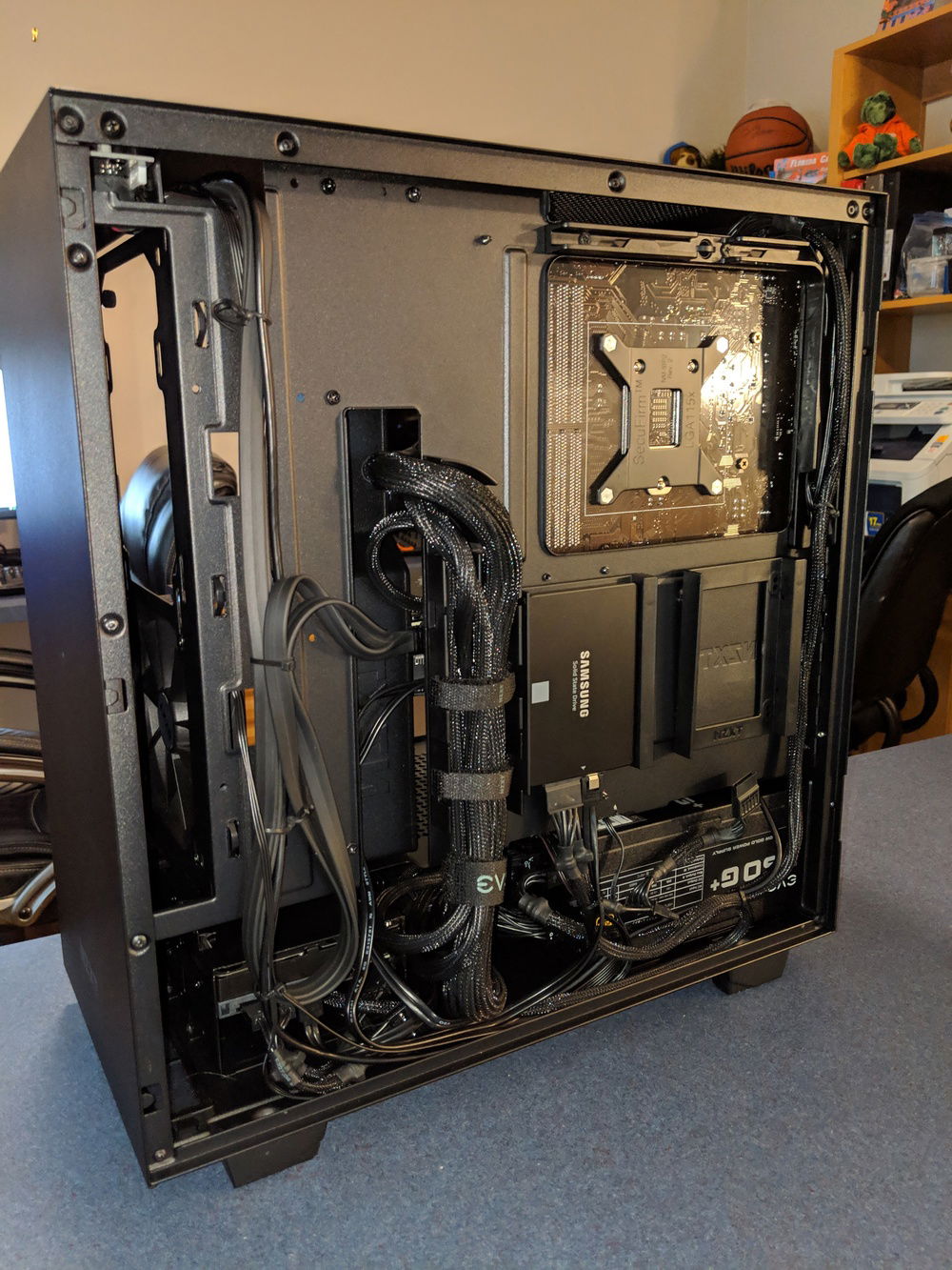 This case has AWESOME cable management & I love the 2x hidden SSD bays