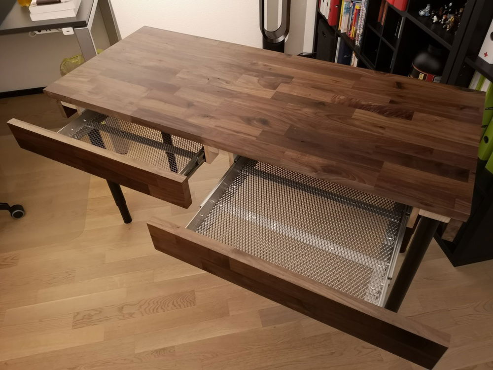 the finished desk on its own with height adjustable legs