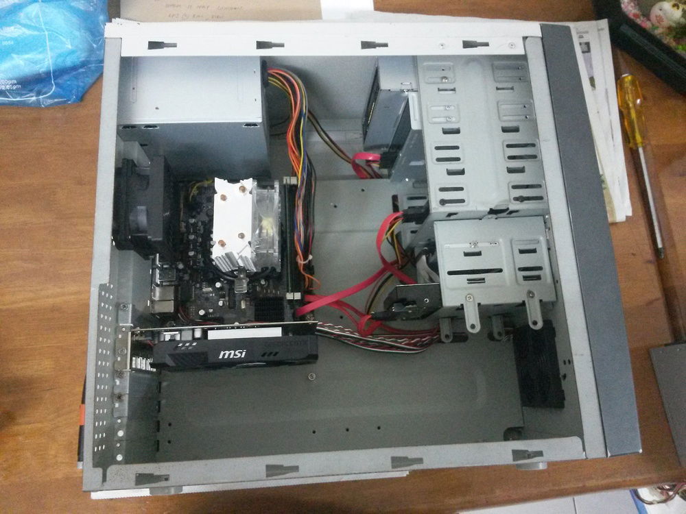 After replacing the PSU and Hard drive, cable management would be much simplified