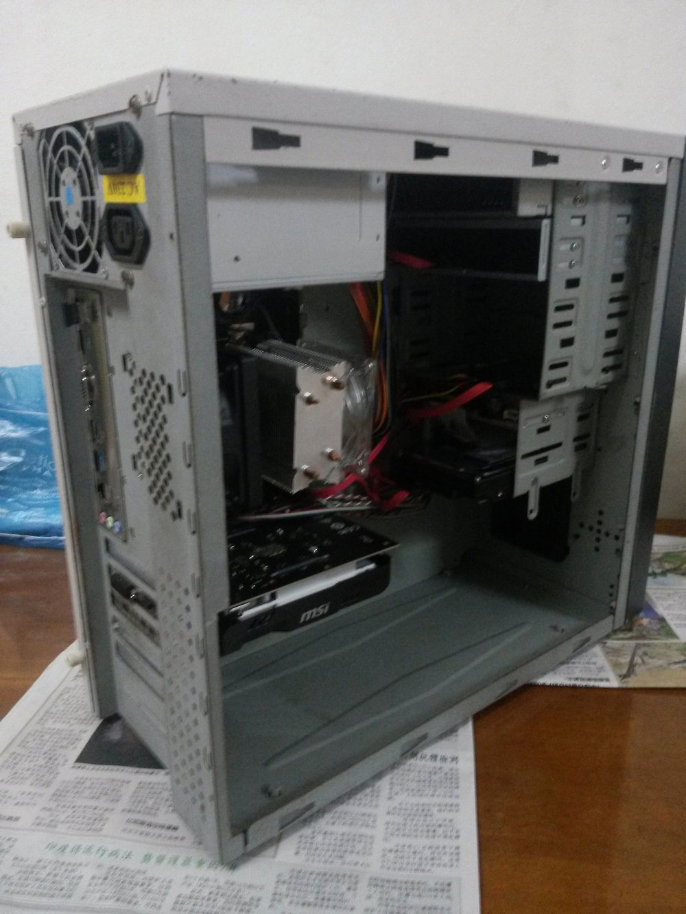 For those who curious why I need to modify the PSU
Look at the back of the PSU mount, if I mount the new one, the fan always face upward instead of downward, which is awful :P