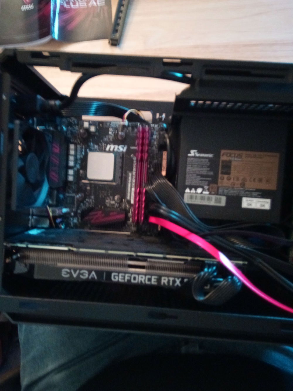 Glad I went with a SFF PSU. An ATX PSU can fit in, but not with a full size graphics card.