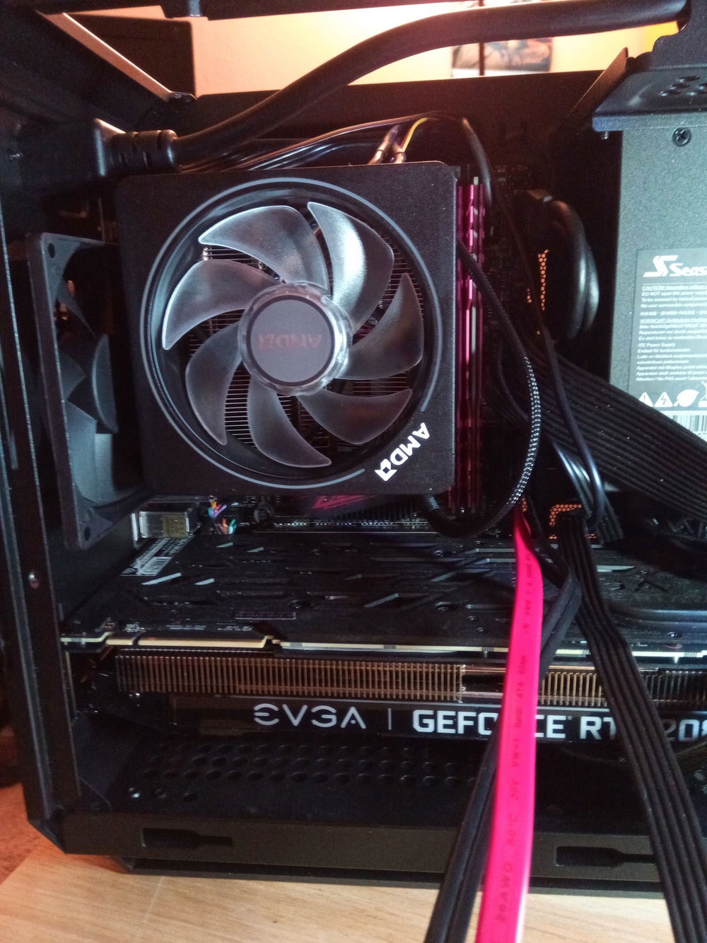 Stock cooler dry fit. The included case fan was removed since being there would do nothing.