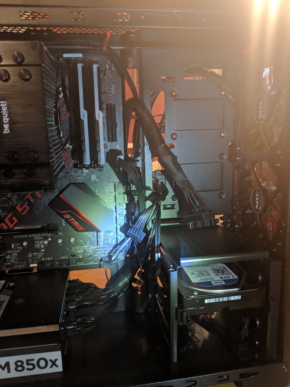 You can see all the cables end up through this hole.... I was hoping to utilize the one right next to the PSU