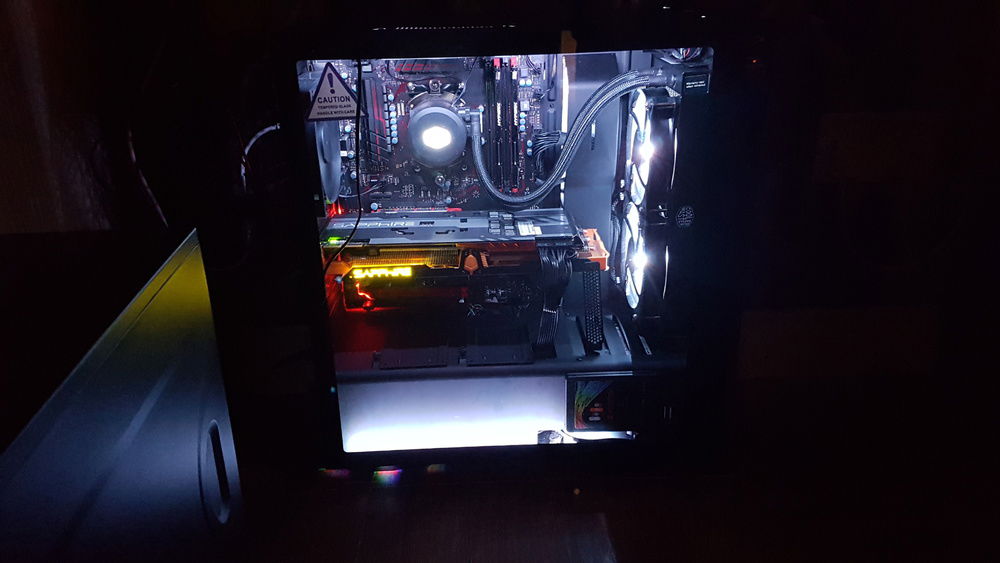 Picture prior to installing GPU brace. I was using one of the rear panel cutouts as a brace which was quite effective if not 100% stable.