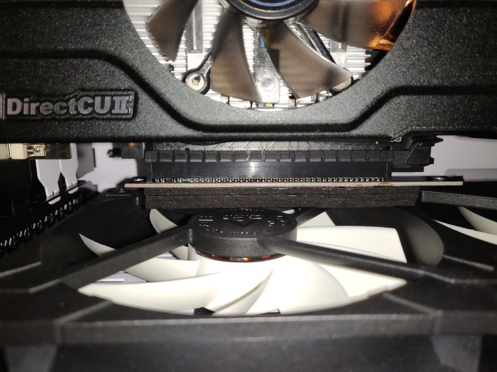 O11D vertical kit, but since I want to populate the bottom fan mounts, the pcie extension had to be held up more creatively