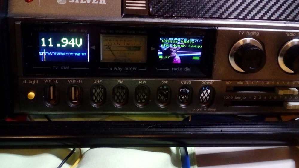 Front unit - showing battery voltage, radio active (showing album art and track playing)