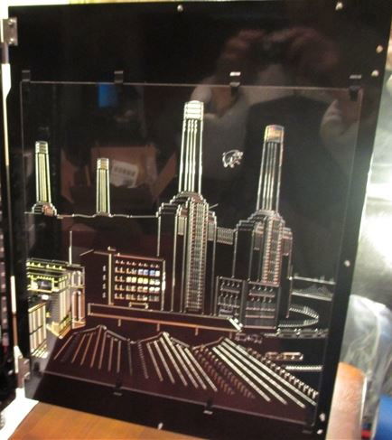 Inside right panel with light shining through to show design