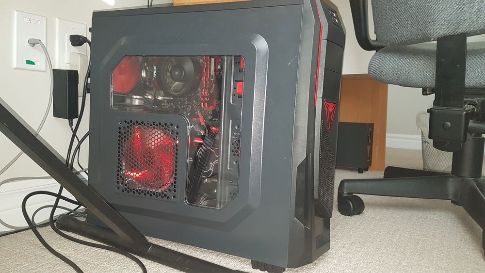 Side panel window. You can see Wraith Stealth and the tip of the Asus Strix R9 390.