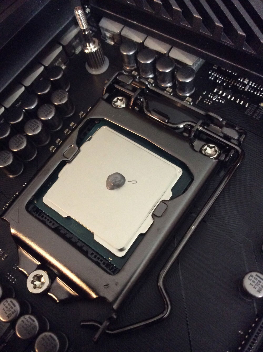 This was my first attempt at applying the thermal paste. I had a feeling it might not be enough. I figured its better to check now instead of having to tear apart the whole loop. So I removed the block and sure enough there was not full coverage. I reapplied the paste to the point I was confident I had full coverage and the rest is history.