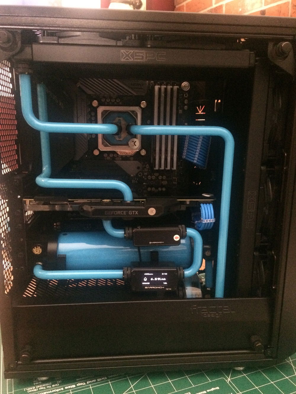 Some pictures have the stock 24pin cable and some have my cable mods cable. I goofed when I bought my blue cables and did'nt buy for the rist "trim" of my PSU. The one and only difference is the 24pin connected into the PSU. I bought cables for the "I" version of my PSU by accident. Cable Mod is the best though, I emailed customer support and they sent me the correct cable no problem.