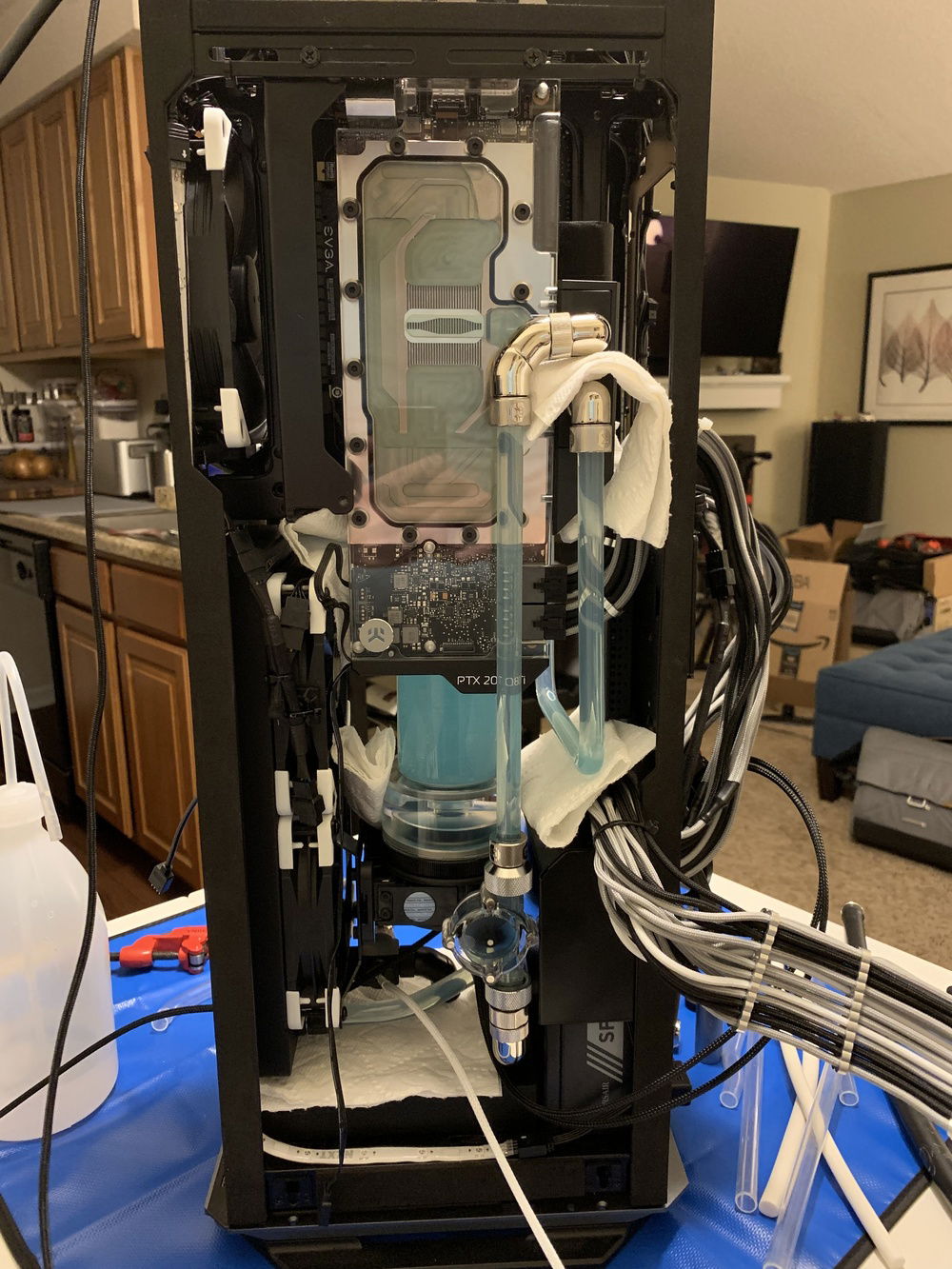 Not a great photo, but you can see the new runs going to the GPU. They are much more visible and gave me room to include a flow-meeter.