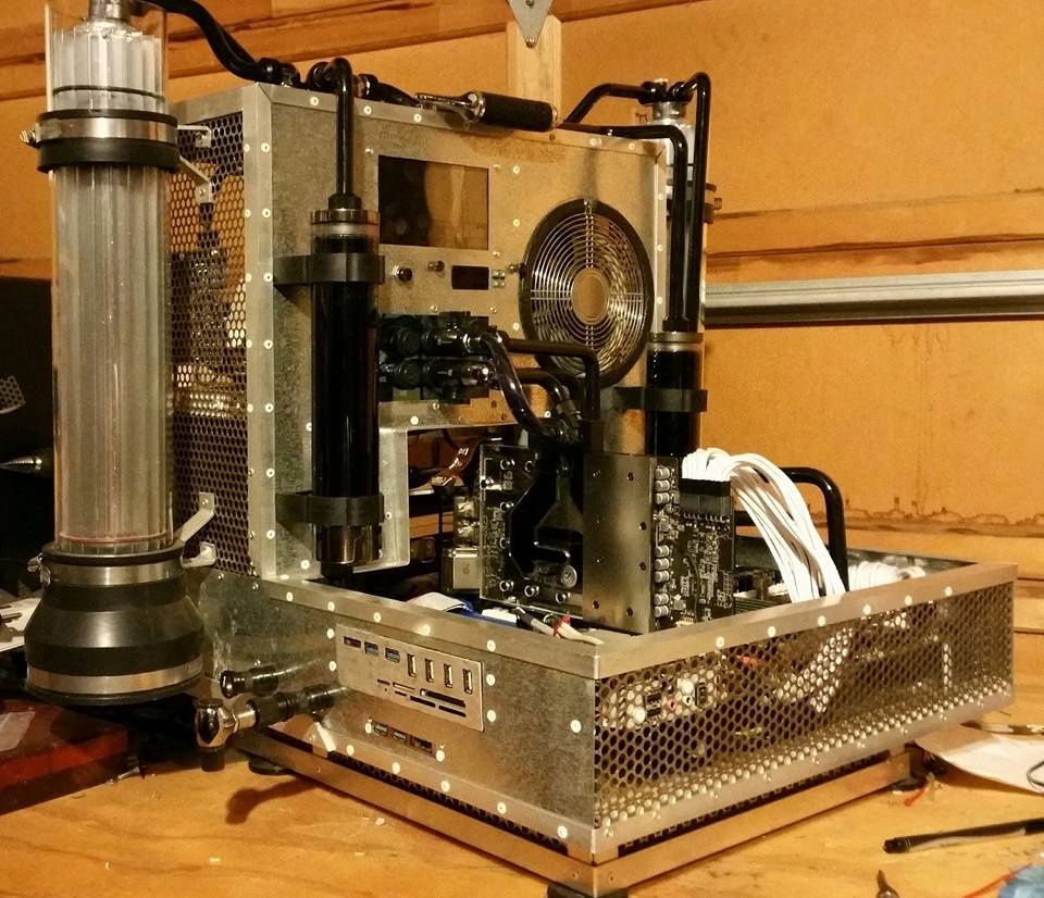 Note the bypass outlets on the side. It allows me to purge, exchange or add fluid without having to breach the loop. On quick-release fitting has a fitting on it for a test drain.